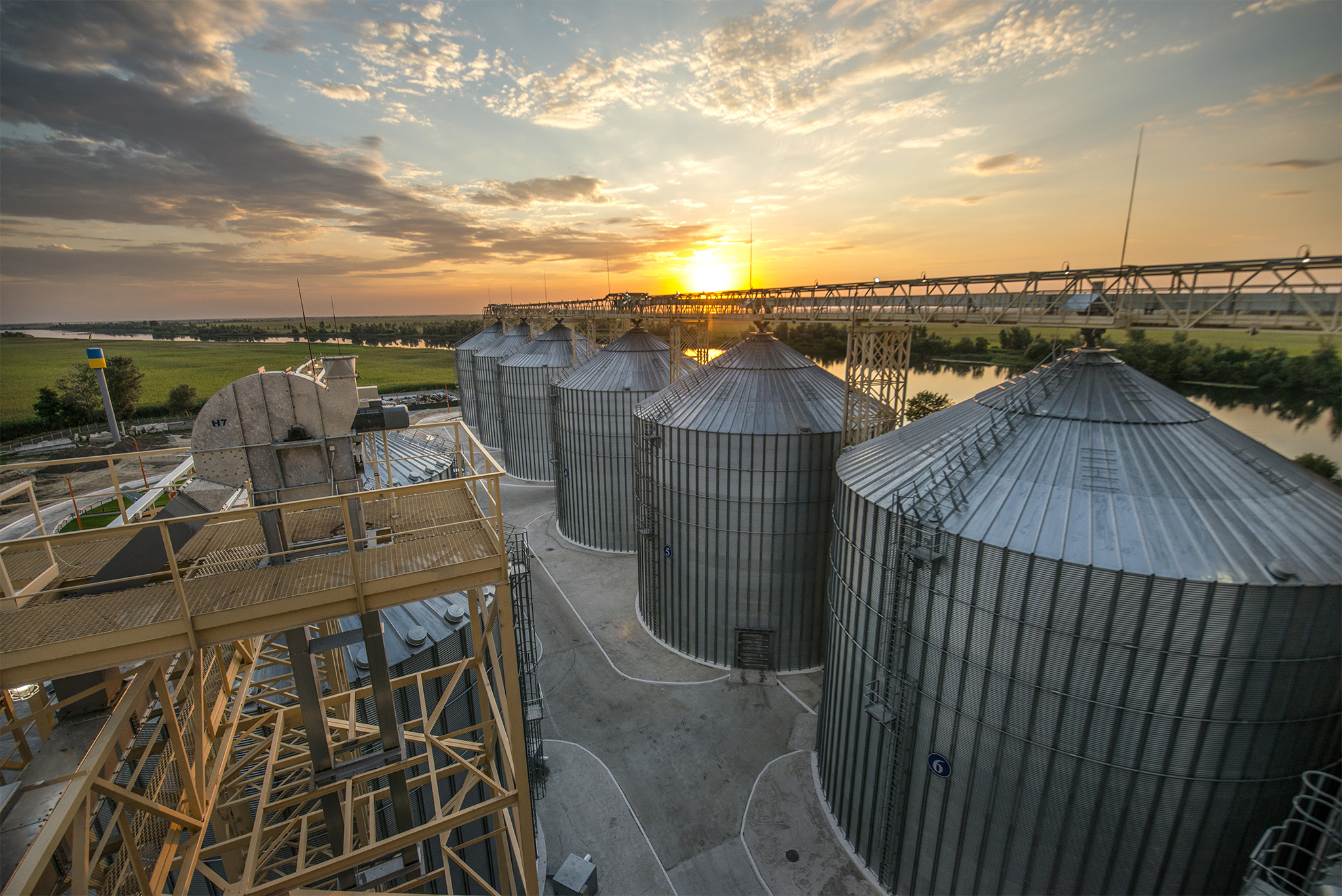A grain elevator at sunset